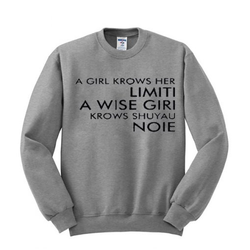 a girl krows her limiti sweatshirt